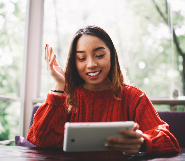 Woman looking at tablet