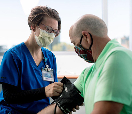 Patient having blood pressure taken