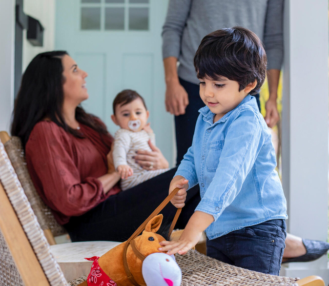 Young family on porch