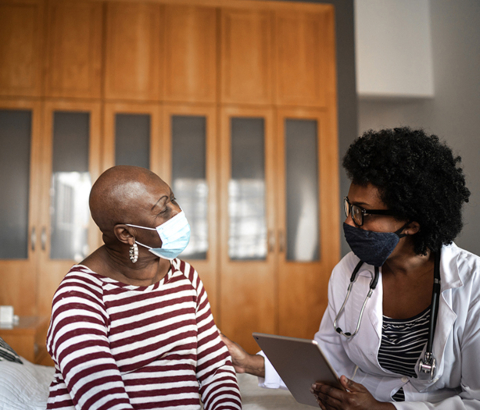 Doctor consulting with patient