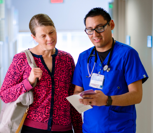 Male nurse speaking to a patient