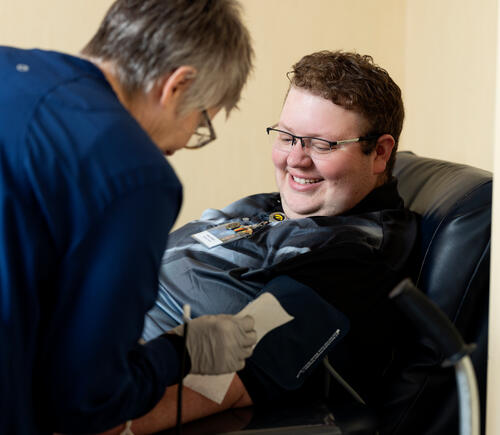 Person being looked at by a nurse