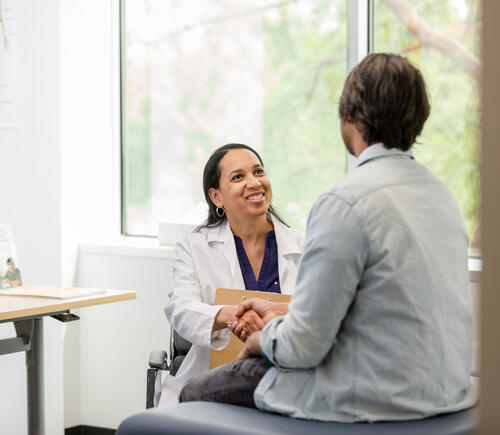 Physician greeting patient