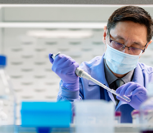 Researcher working with samples