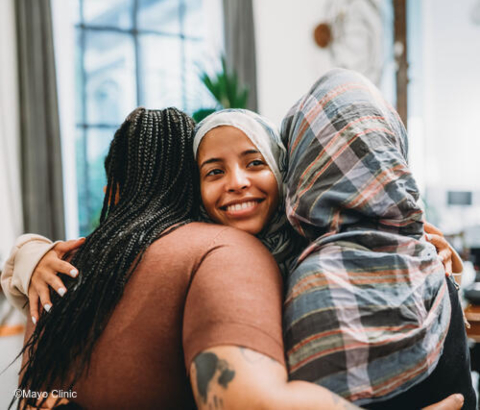 Group of friends hugging