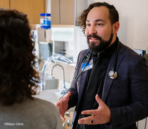 Doctor talking with patient