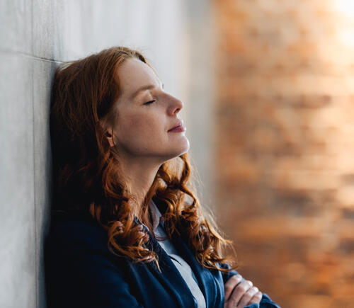 Adult woman with closed eyes