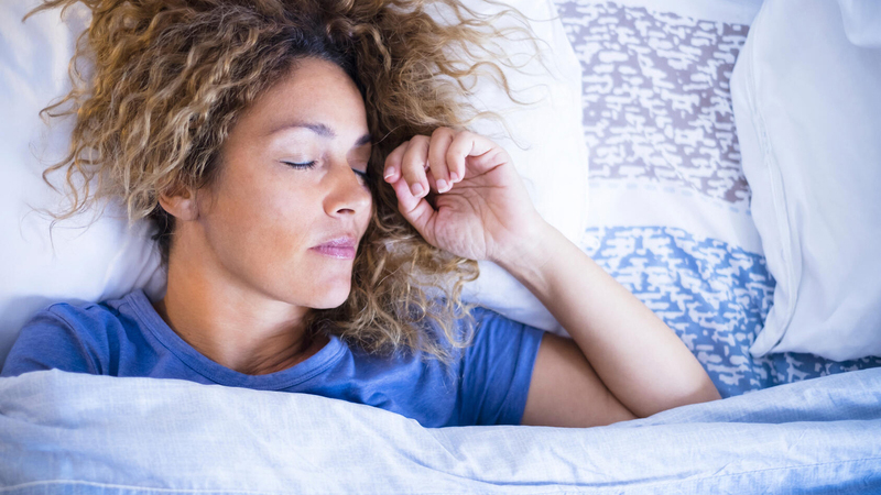 Woman in bed sleeping