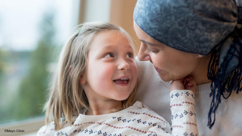 Mother and daughter looking at each other