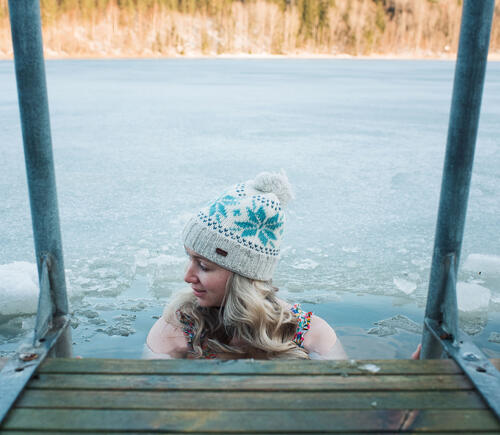 Woman in an icy pond