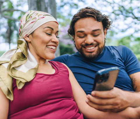 Couple looking at phone