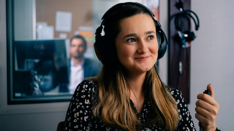 Woman wearing headphones for a hearing test