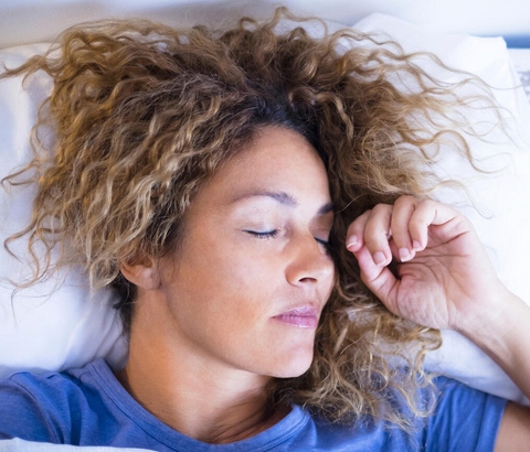 Woman sleeping in bed