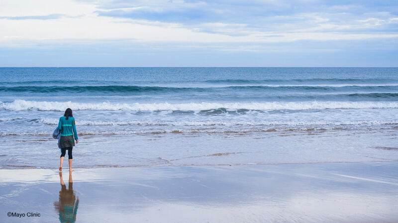 Person walking on the beach