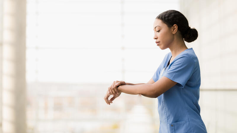 Woman wearing scrubs