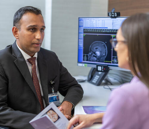 Doctor talking with patient