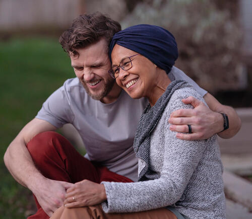 Man and woman laughing together