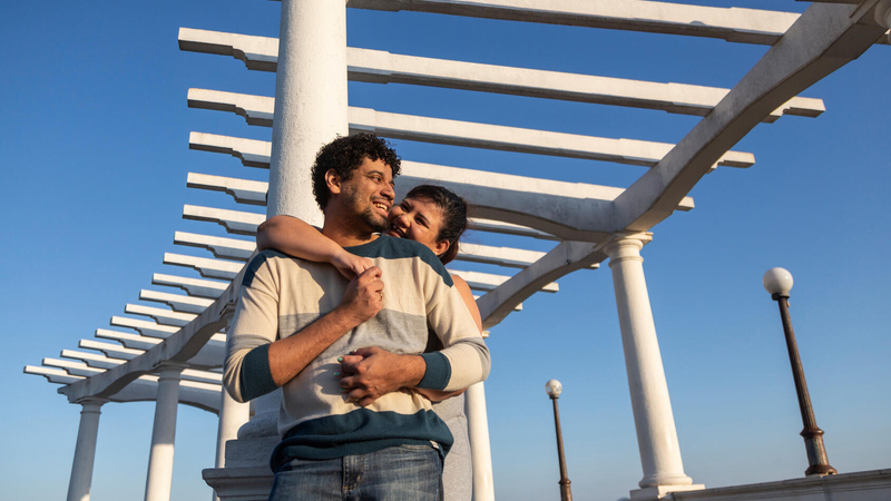 Couple hugging outside