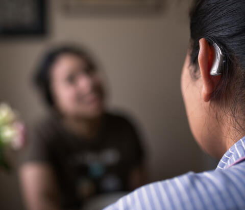 Woman wearing hearing aid