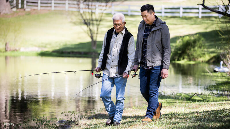 Father and adult son fishing