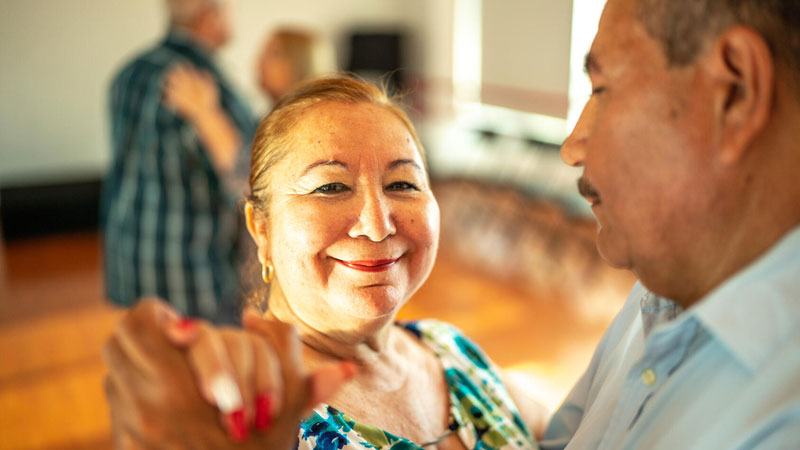 Couple dancing and smiling