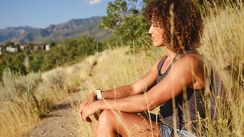 Person sitting in grass