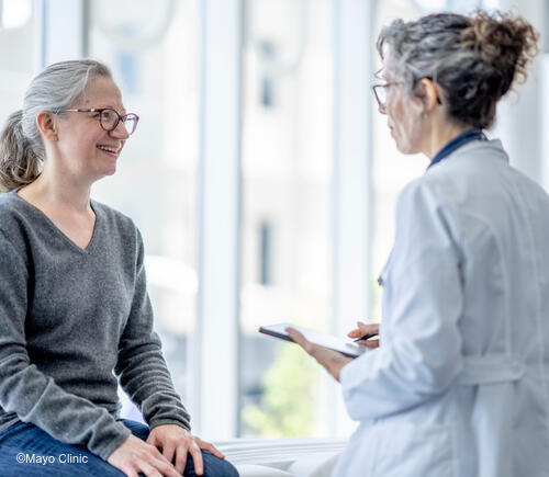 Doctor talking with patient