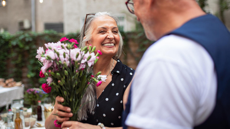 Woman buying flowers