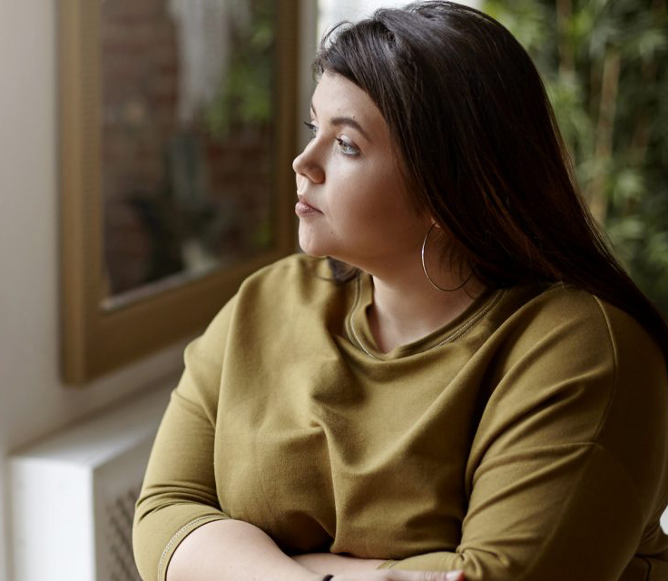 Woman sitting in chair