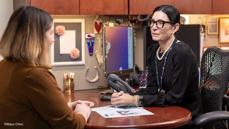 Doctor talking with patient