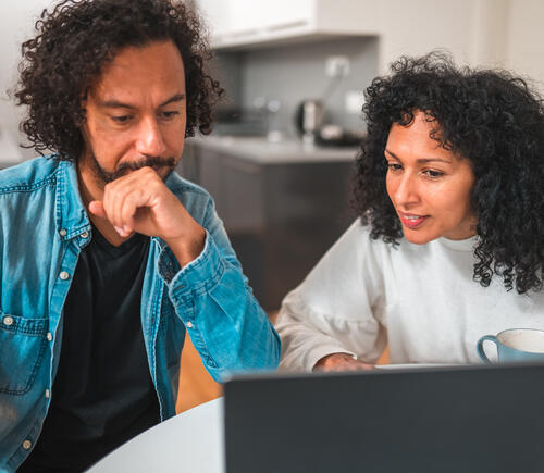 Couple working laptop