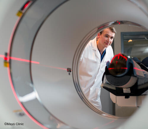 Patient going into imaging machine.