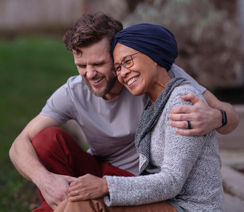 Adult couple embracing each other