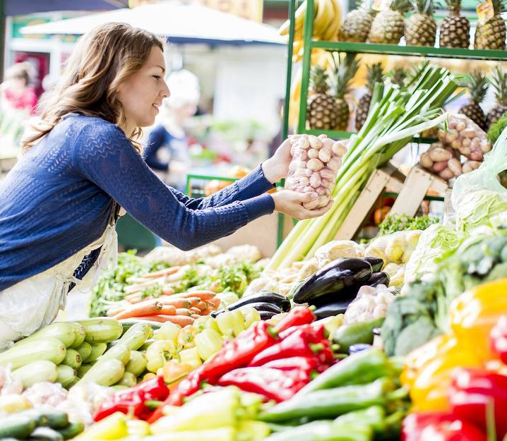 Woman buying produce