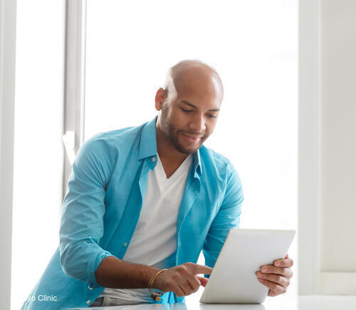 Man using tablet.