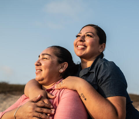 Two women embracing