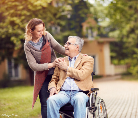 Caregiver smiling with husband