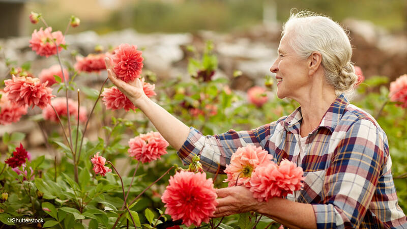 Woman tending to flowers