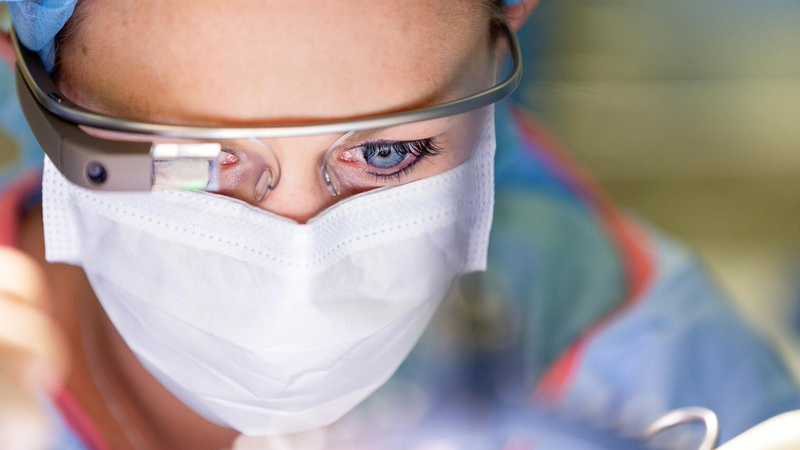 Surgeon wearing Google Glass