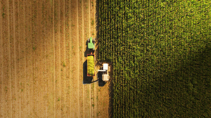 Aerial view of a tractor in a field