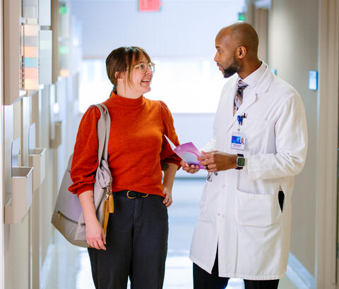 Doctor talking with patient