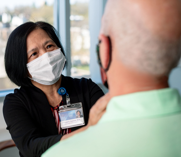 Doctor checking patient's glands